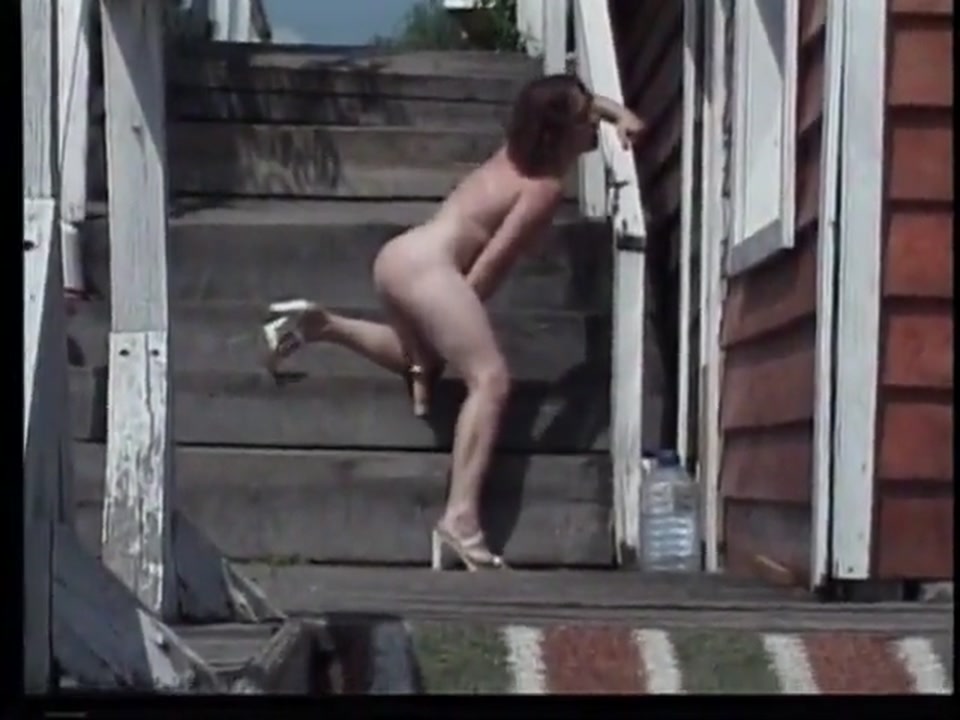 A red headed slut with a great plump ass sucks a dildo screenshot 2