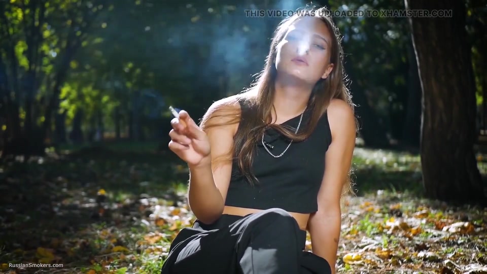 Seductive Russian Beauty Smoking Cigarette in Studio screenshot 5